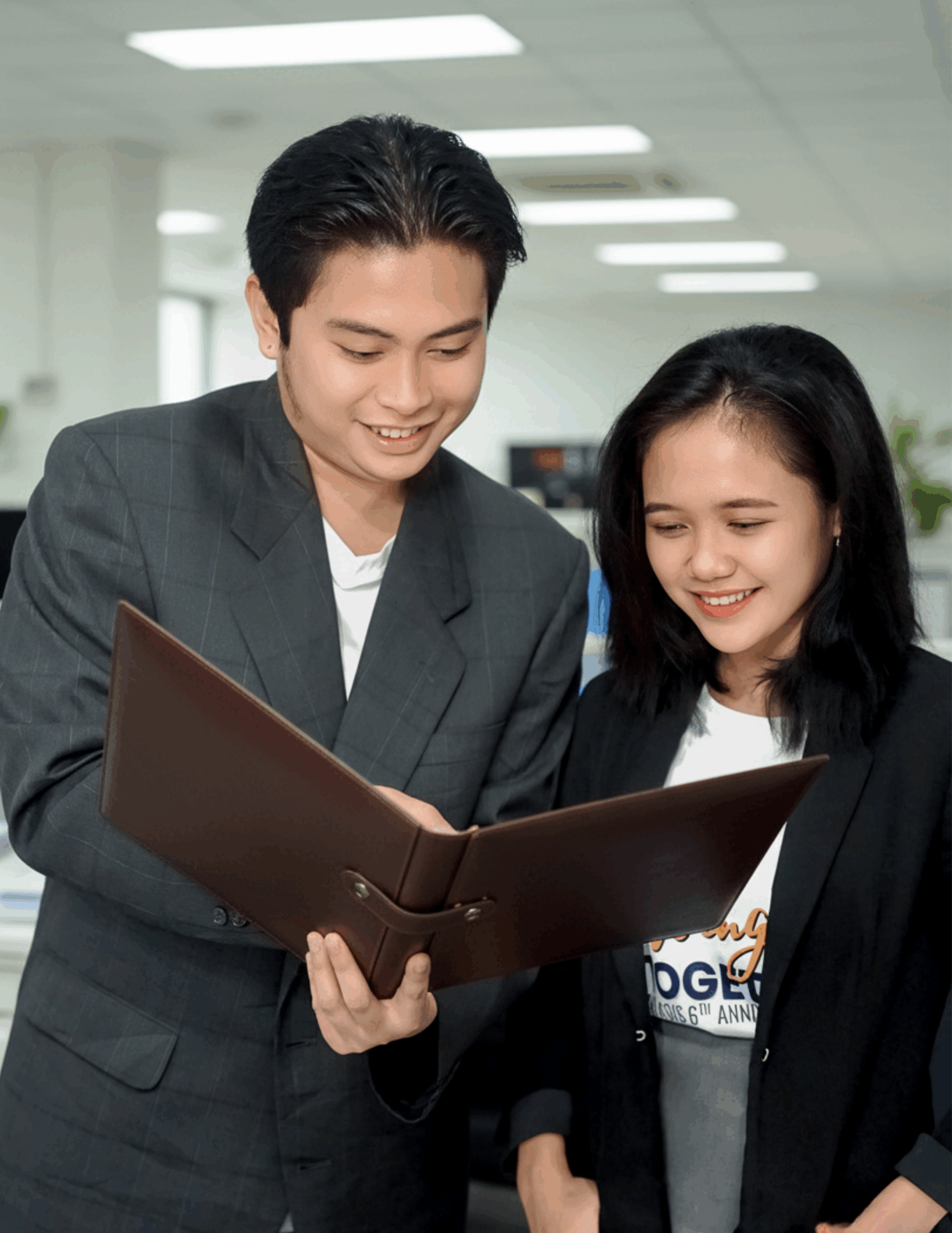 Antasis colleagues reviewing work together in the office